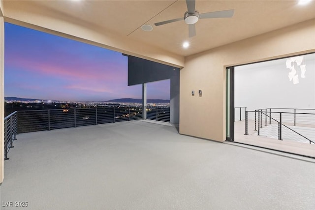 view of patio featuring a ceiling fan