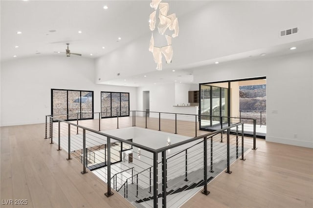 dining space featuring light wood-style floors, recessed lighting, visible vents, and baseboards