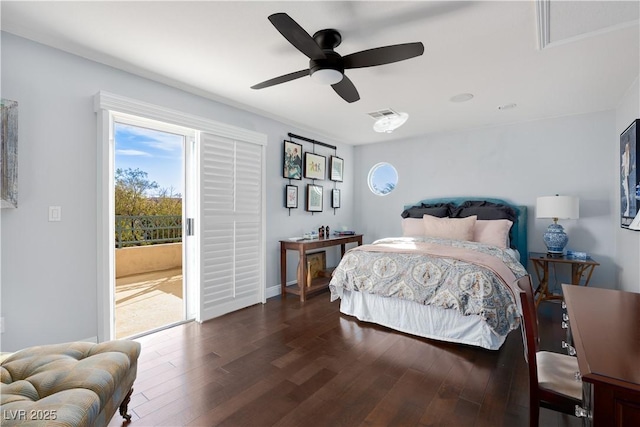 bedroom featuring access to exterior, dark wood-style floors, visible vents, ceiling fan, and baseboards