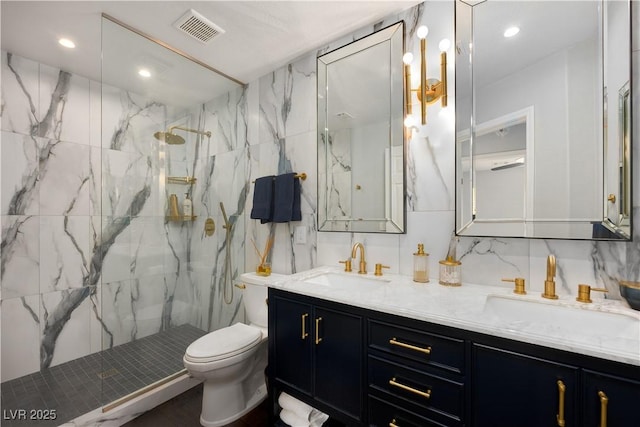 bathroom with tasteful backsplash, a sink, visible vents, and tile walls