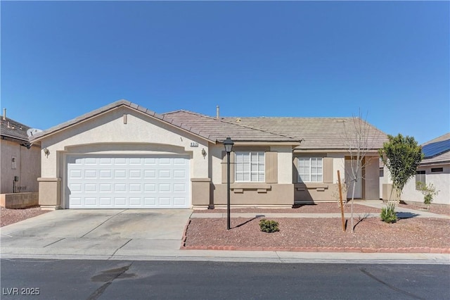 ranch-style house featuring a tile roof, driveway, an attached garage, and stucco siding