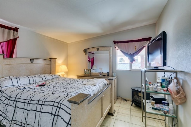 bedroom featuring light tile patterned floors