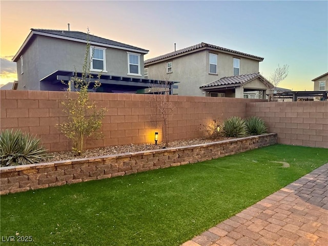 view of yard featuring a fenced backyard