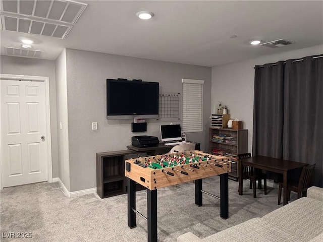 recreation room with light carpet, baseboards, and visible vents