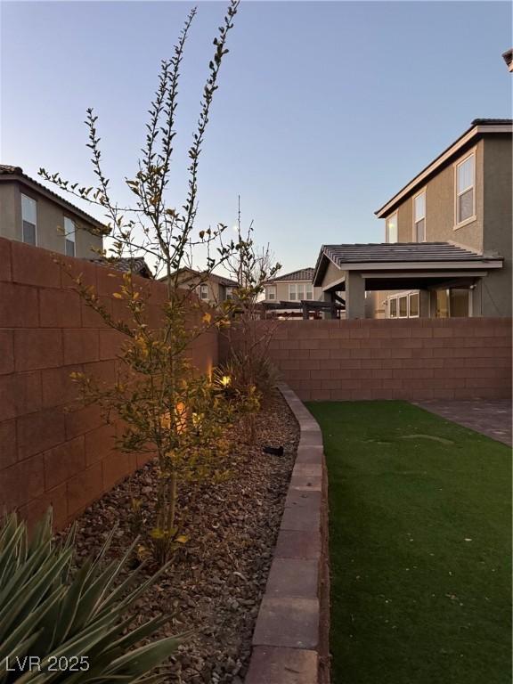 view of yard featuring a fenced backyard