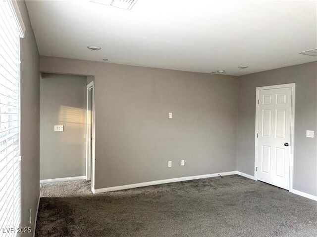 carpeted empty room with baseboards and a healthy amount of sunlight