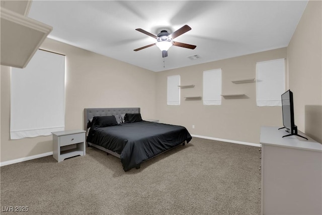 carpeted bedroom featuring visible vents, ceiling fan, and baseboards