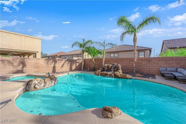 view of pool featuring a fenced backyard, a fenced in pool, and an in ground hot tub