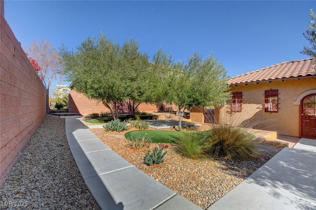 view of yard with fence