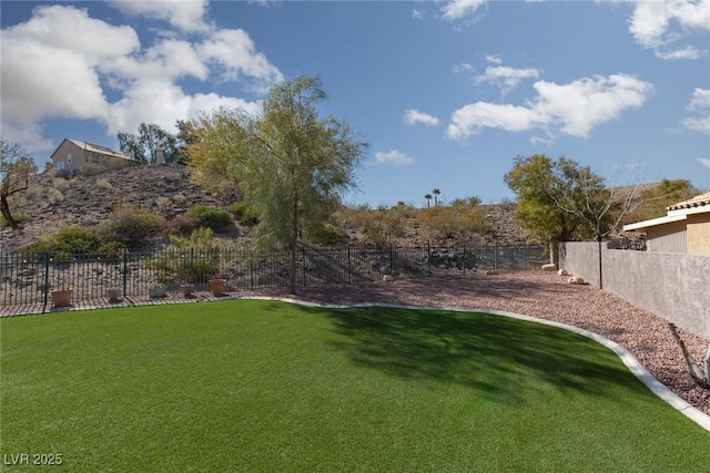 view of yard with fence