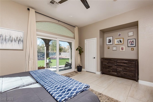 bedroom featuring baseboards, ceiling fan, visible vents, and access to exterior