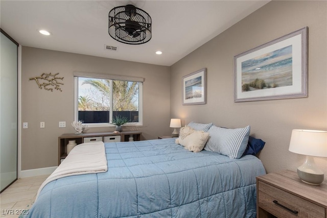 bedroom with baseboards, visible vents, and recessed lighting