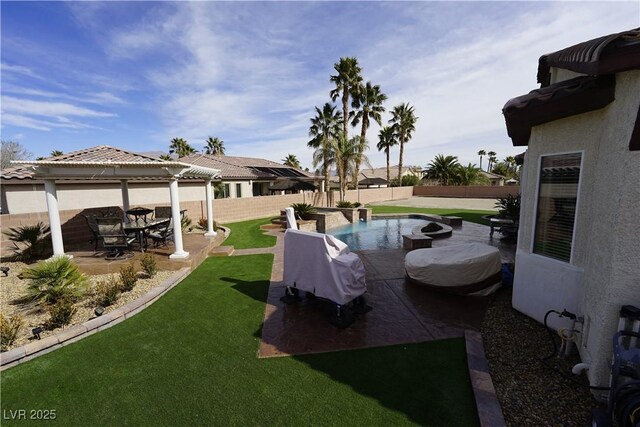 view of yard featuring a gazebo, a fenced in pool, a patio, and a fenced backyard