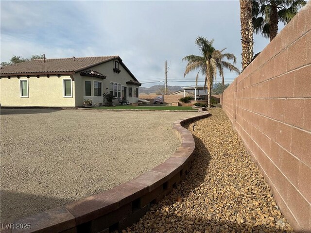 view of yard with fence