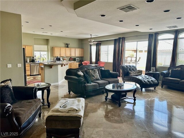 living room featuring visible vents