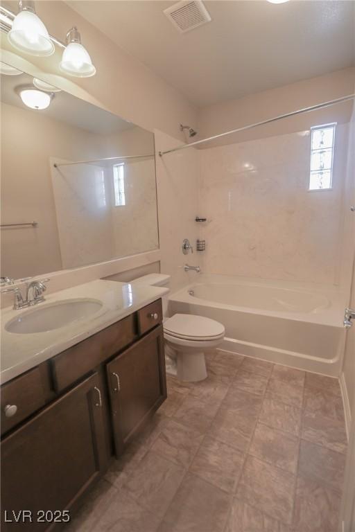 full bathroom with toilet, shower / tub combination, visible vents, and vanity