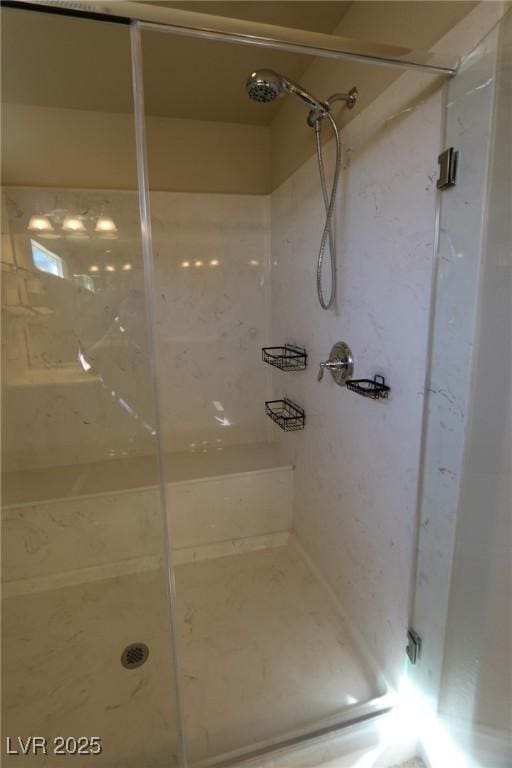 full bathroom featuring a shower stall