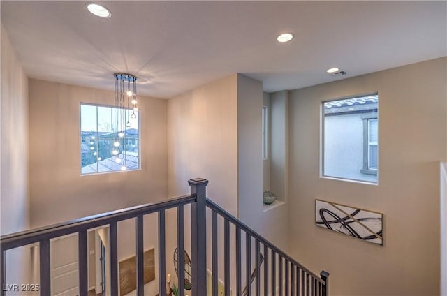 stairs featuring recessed lighting