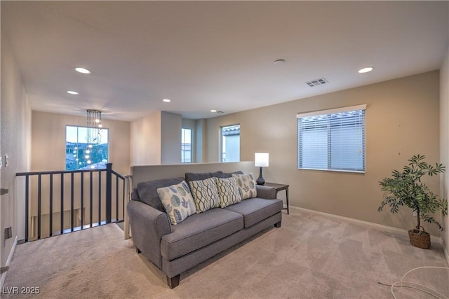 living room featuring visible vents, carpet, and recessed lighting