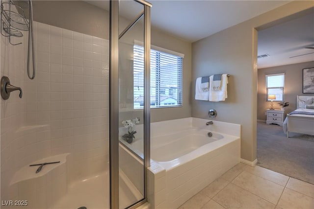 full bathroom with a bath, visible vents, tile patterned flooring, and a shower stall
