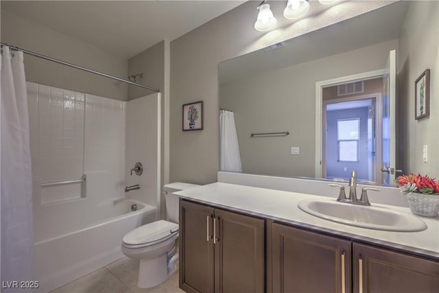 bathroom with visible vents, tile patterned flooring, vanity, and toilet