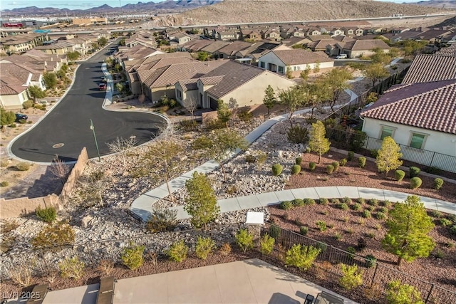 aerial view with a mountain view and a residential view