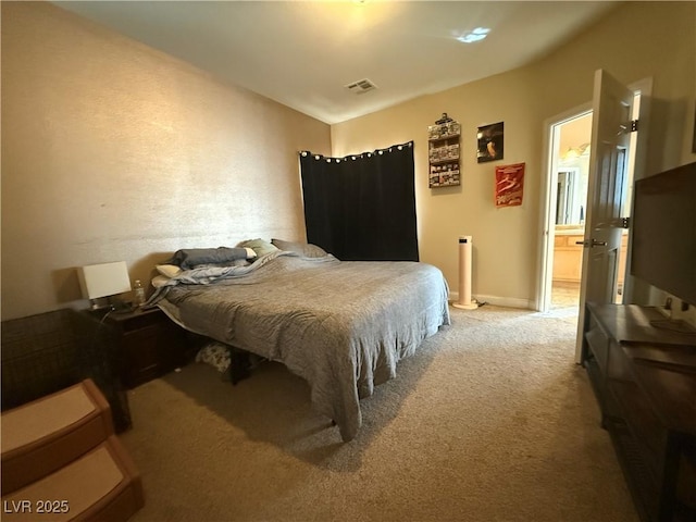 bedroom featuring carpet, visible vents, and baseboards