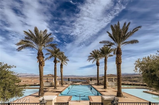 21 Via Visione Unit 201, Henderson, NV 89011 - community pool with a patio area and a mountain view