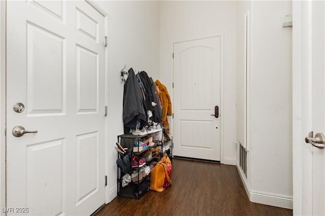 entryway featuring dark wood finished floors