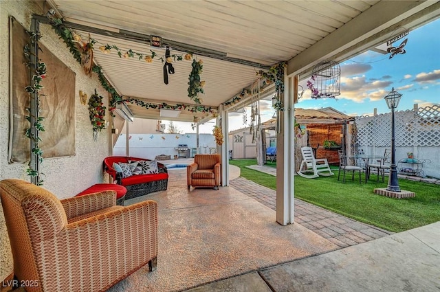 view of patio / terrace with a fenced backyard and outdoor lounge area