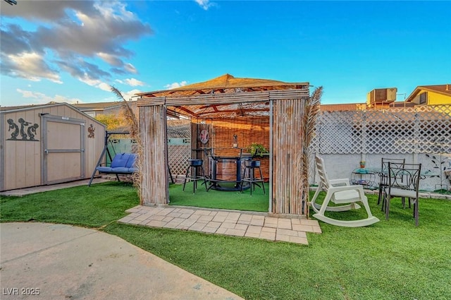 view of shed with fence