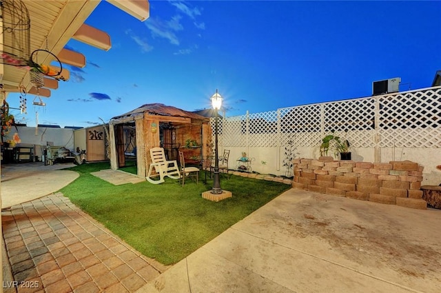 view of yard featuring a patio area and a gazebo