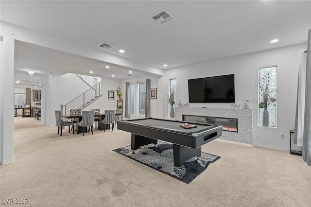 recreation room with visible vents, a tiled fireplace, light colored carpet, pool table, and recessed lighting