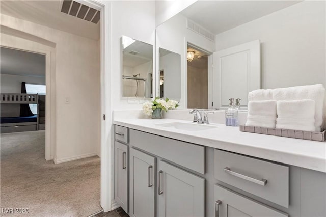 full bath with visible vents and vanity