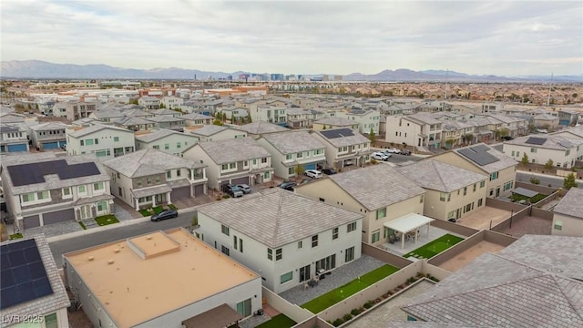 bird's eye view with a residential view and a mountain view