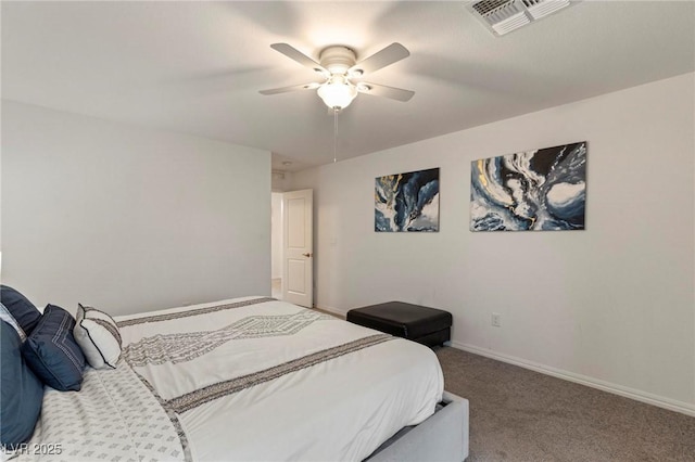 carpeted bedroom with a ceiling fan, visible vents, and baseboards