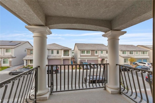 balcony featuring a residential view