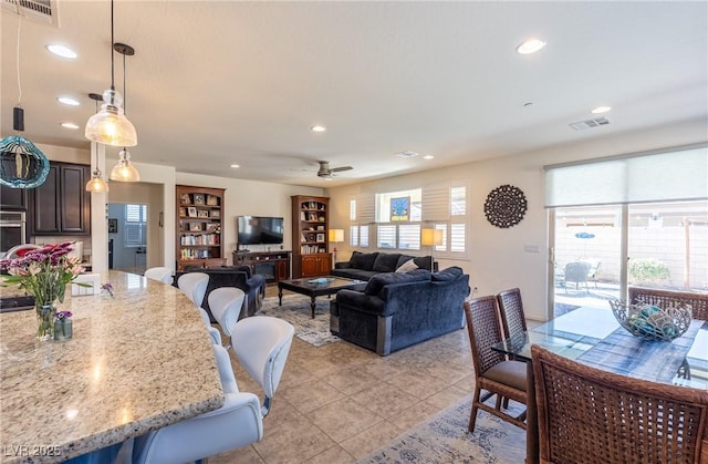 dining area featuring recessed lighting, visible vents, and a healthy amount of sunlight