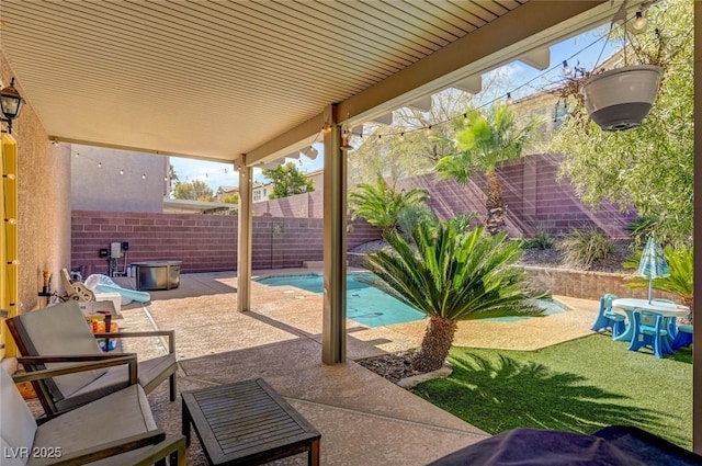 view of patio with a fenced backyard