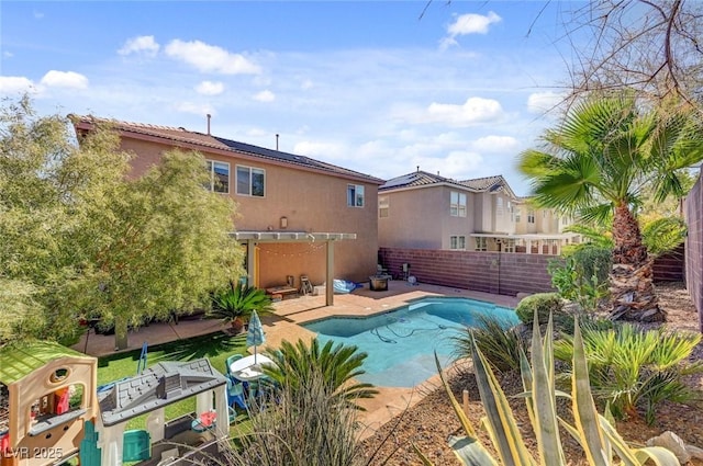 view of pool featuring a patio area, a fenced backyard, and a pergola