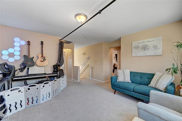 living area with light colored carpet