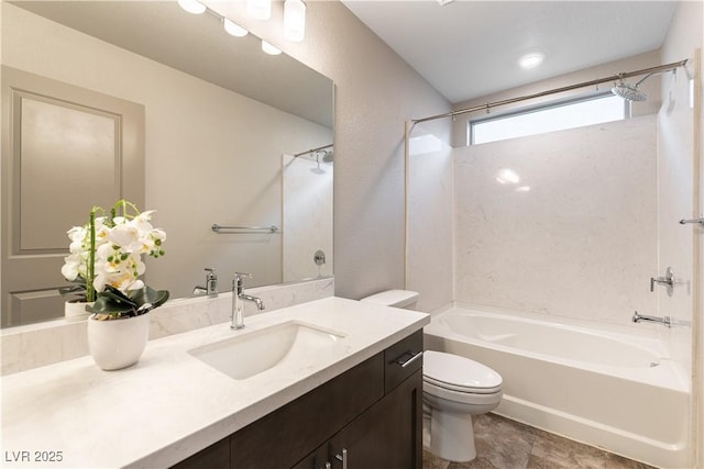 bathroom with  shower combination, vanity, and toilet