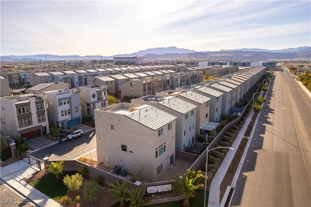 aerial view featuring a residential view and a mountain view