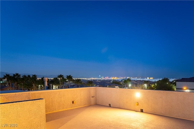 view of patio / terrace with a balcony