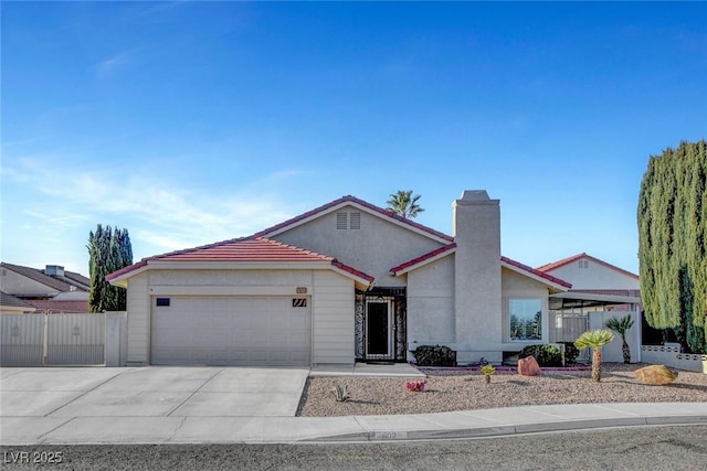 ranch-style house with driveway, a chimney, an attached garage, and stucco siding