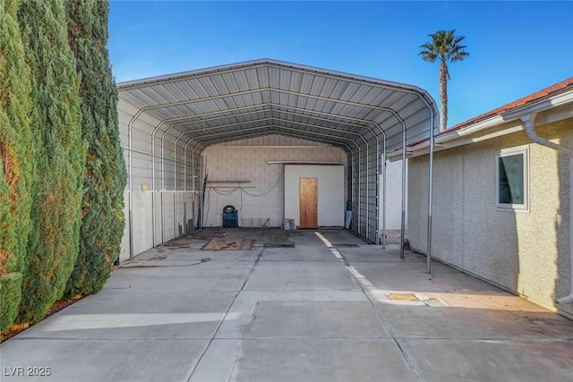 view of parking / parking lot with a detached carport