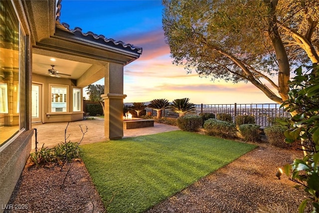 view of yard with a patio and fence