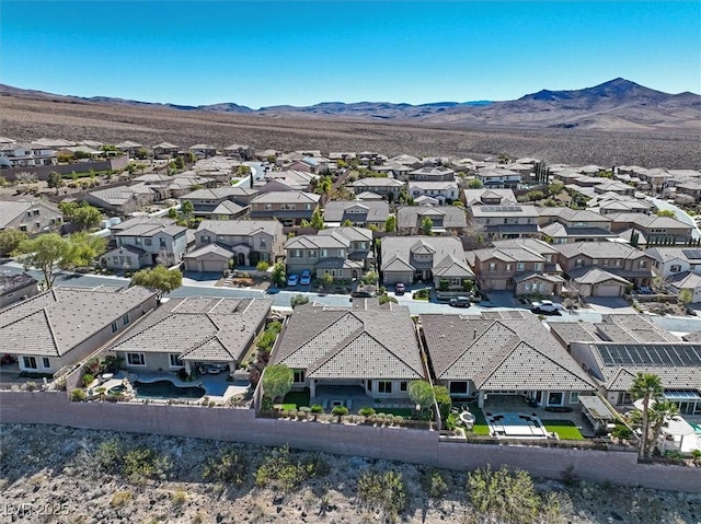 aerial view with a residential view and a mountain view