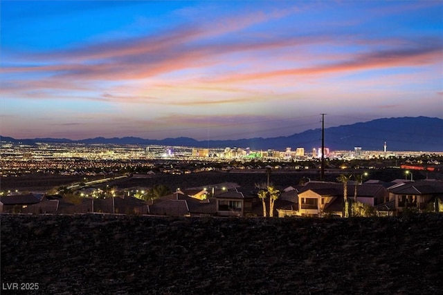 mountain view featuring a view of city