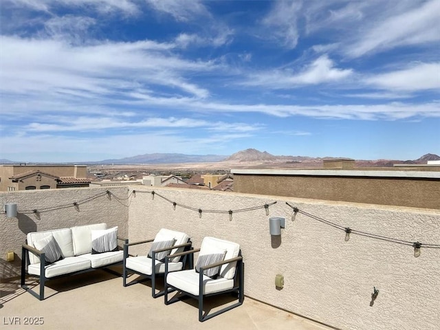 exterior space with outdoor lounge area and a mountain view